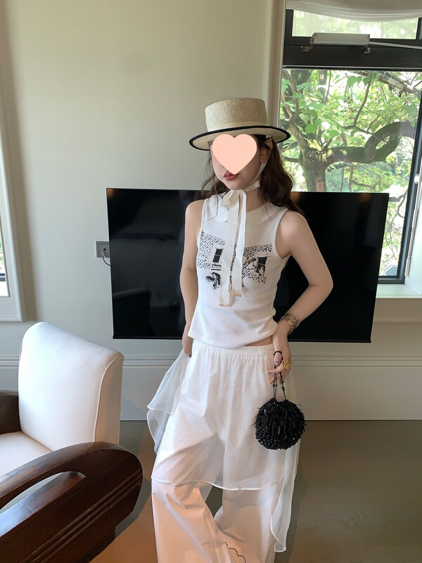 ル・ルージュ 周美梅 レトロで子供っぽい白いプリントドールカラーワッフルノースリーブベストトップ|undefined