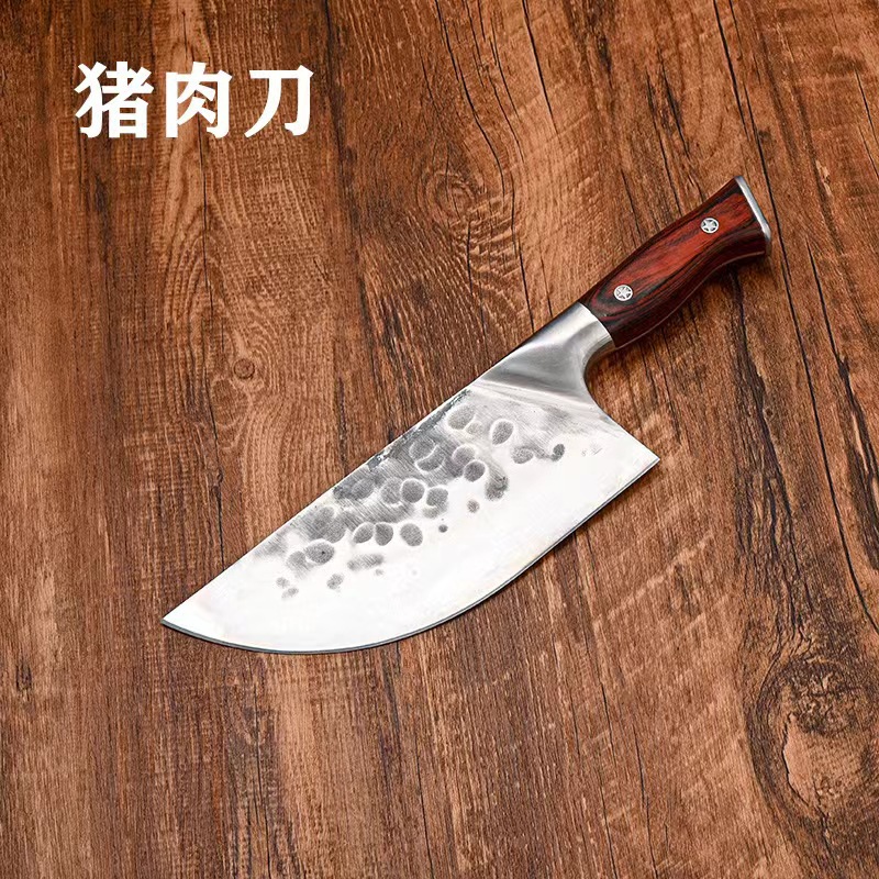 빨간 손잡이가 달린 돼지 고기 칼