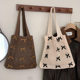 Shoulder bag messenger bag women's versatile 2025 new bow element simple hollow knit bag handbag wholesale