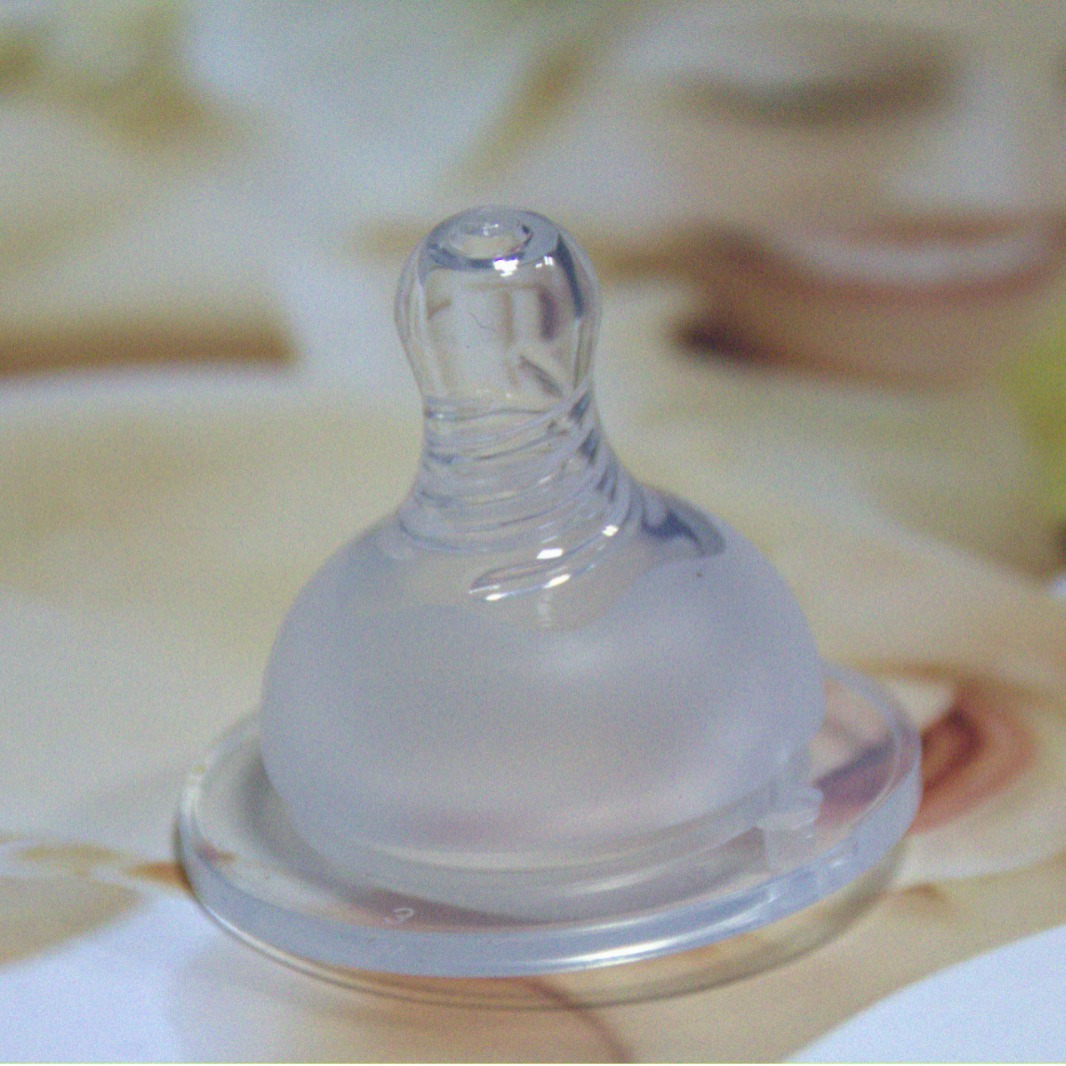 Venta directa de fábrica de pezón de silicona de sentido real Leche materna espiral de boca ancha bebé