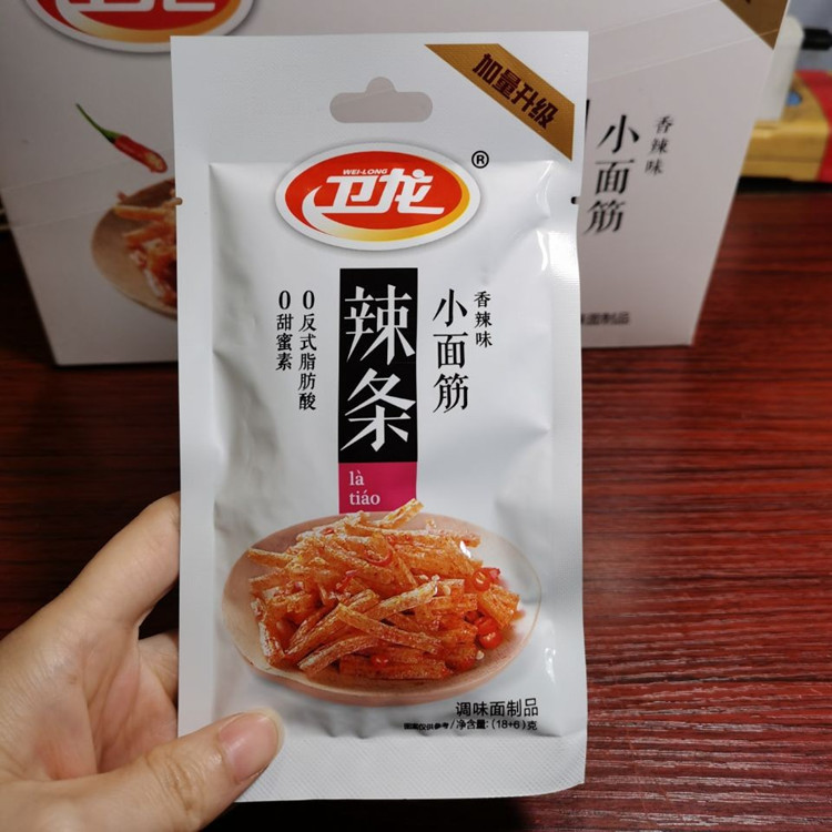 Wailong Xiaojin 24g Spicy Flavor Latiao Full Carton 240 Pouches Transparent Packaging Classic Nostalgic Snack