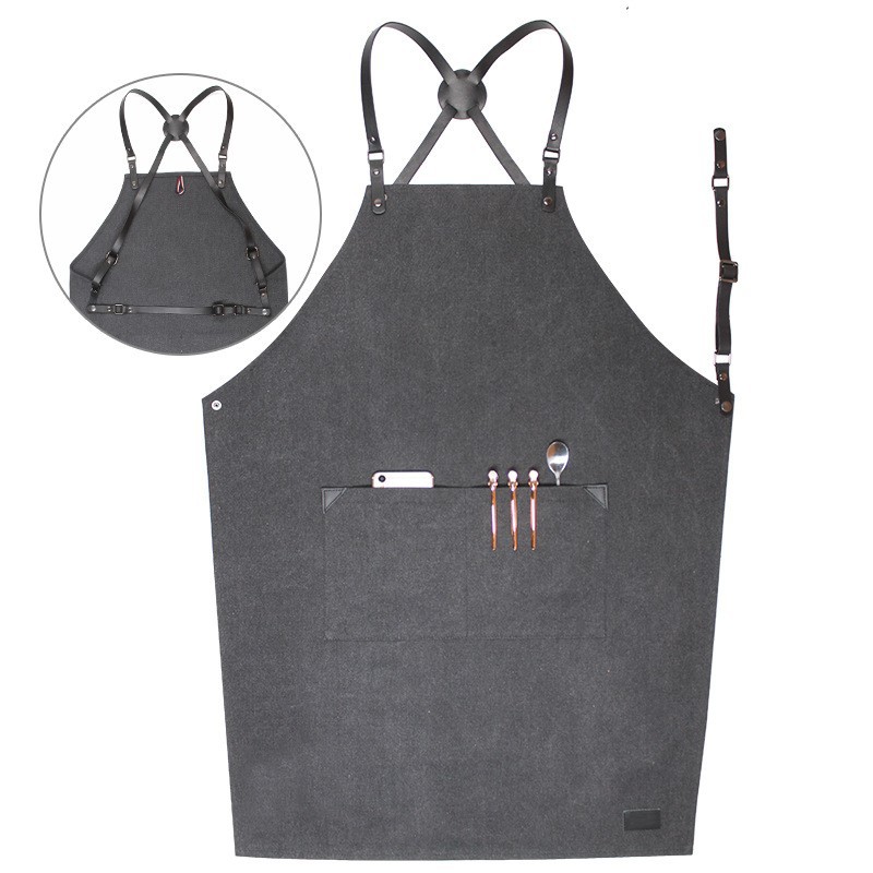 Comercio exterior delantal de lona gruesa peluquería cafetería panadería ropa de trabajo PU cuero correa ajustable delantal al por mayor