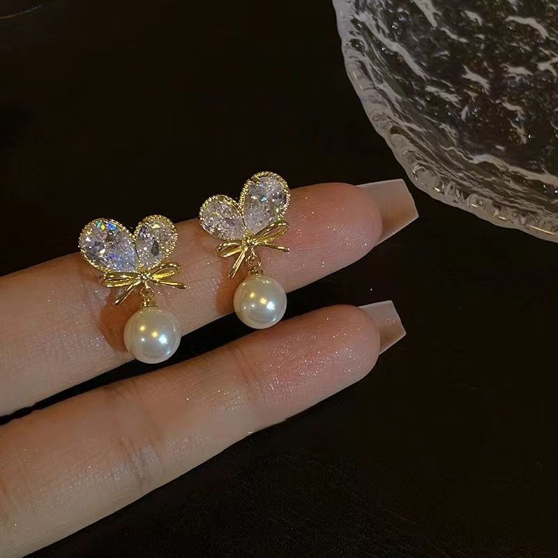 Sophisticated cute earrings with zircon with bow pearl with tassels