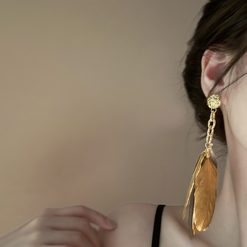 Boucles d'oreilles à pompon en plumes dorées et argentées, boucles d'oreilles rétro de niche française, boucles d'oreilles de style ethnique exotique, nouvelles boucles d'oreilles de style chinois_voghion.com