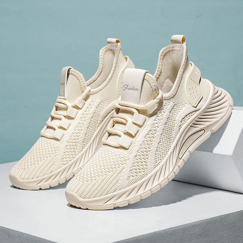 Zapatillas de deporte de talla grande estilo pareja para mujer, calzado de mujer de primavera con tejido Flyknit, zapatillas de running transpirables de suela blanda, calzado cómodo de una sola pieza.
