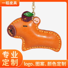 カピバラの牛革の漫画は自動車のキーホルダーを掛けてアクセサリーのかわいいモルモットの女子学生の創意の小さい贈り物を掛けます。
