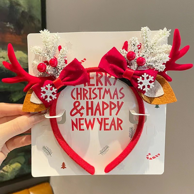 クリスマス鹿の角のカチューシャの子供の祝日はヘラジカのカチューシャを装います。|undefined
