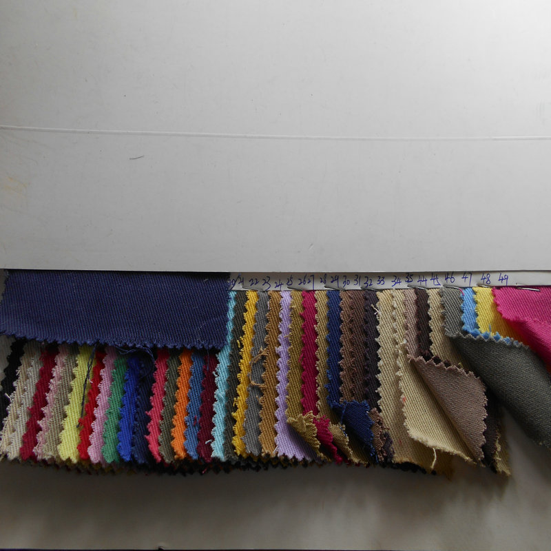 现货批发10X10特厚赛络纺全棉全工艺活性环保斜纹裤料时装面料图