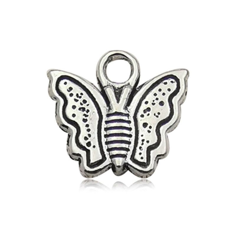 Venta transfronteriza de colgante de aleación de plata Xizanga con forma de mariposa, hecho a mano, para collar, pulsera, accesorio de joyería, venta al por mayor.