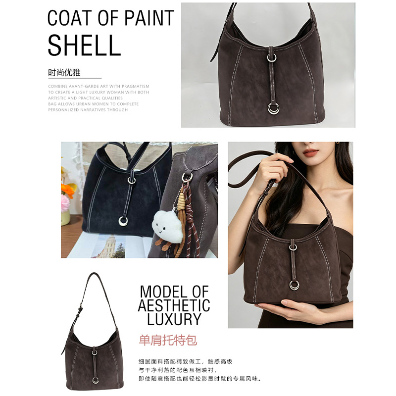 Niche Zhong retro buckle brazaleta alta sensación de viaje bolsa de hombro de moda exquisita bolsa de mano de mujer