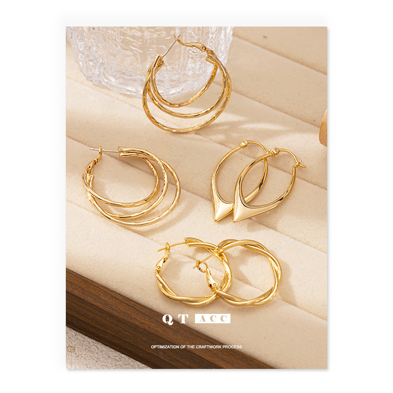 Moda europea y americana de moda fresca, perfiles de alta calidad, líneas laminadas de círculo, personalidad delicada y simple, pendientes de estilo de temperamento para mujeres
