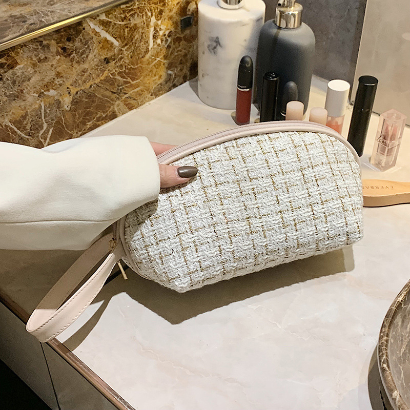 Estilo coreano Denim Chanel estilo de mano bolsa de cosméticos de alto aspecto tejido tablero de gran capacidad lápiz labial bolsa de almacenamiento al por mayor