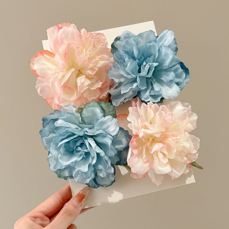 2025 brota de cabello en línea sensación de alto nivel rosa boca de pato mar de cabello cortado bordes de cabello clip de cabello flores adornamiento de cabello mujer