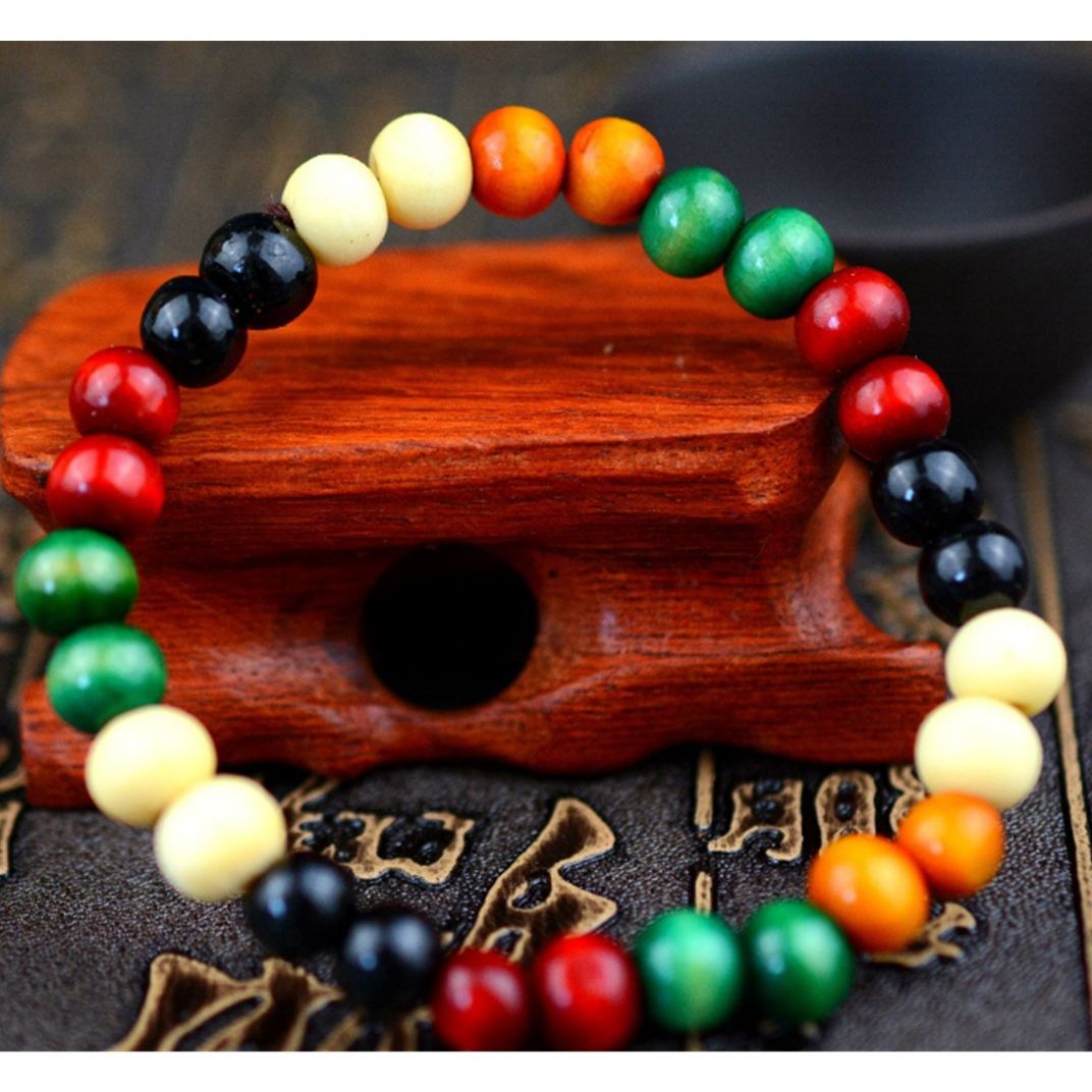 2 yuanes tienda puesto suministro 8MM sándalo solo anillo Buda cuentas pulsera Buda palabra cuentas de madera pulsera al por mayor