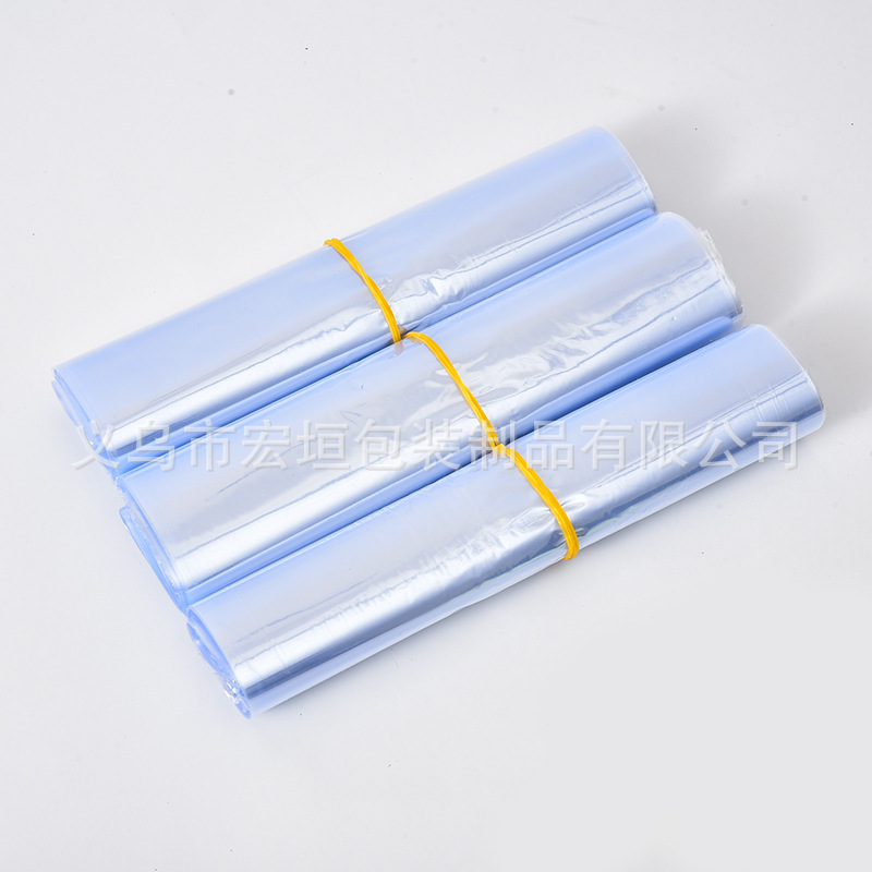 Fuente de la fábrica gran bolsa de PVC Termocontraíble hogar a prueba de polvo película de plástico secador de pelo plástico sellado bolsa de embalaje de película Termocontraíble