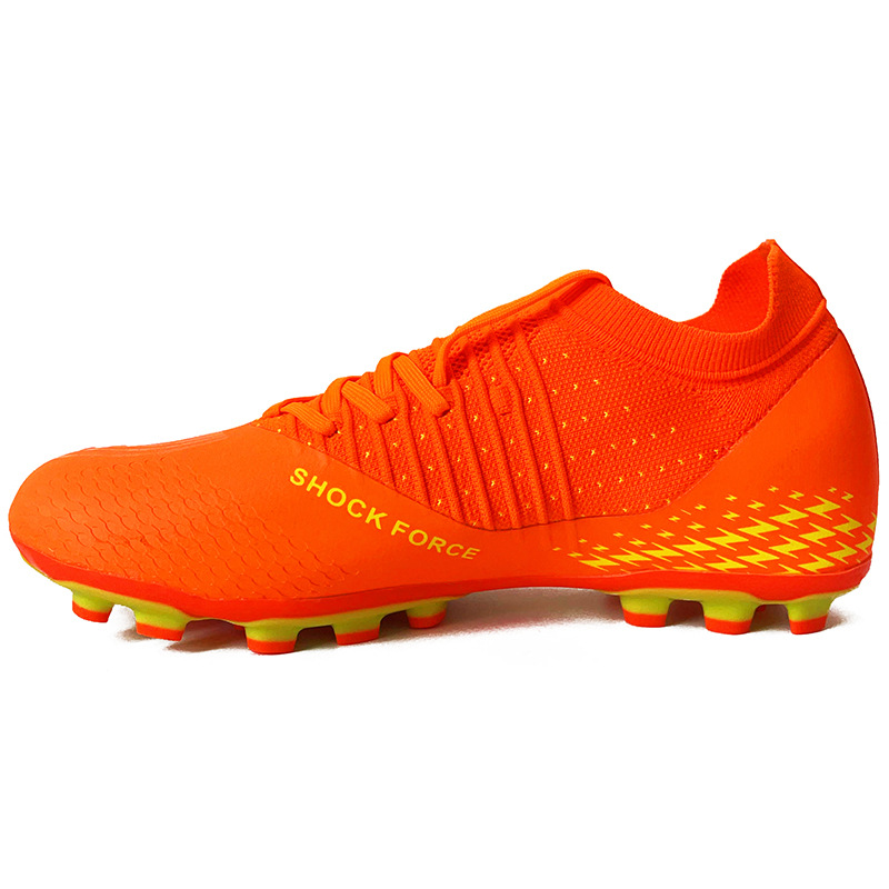 Zapatos de fútbol transfronterizos Putian sin costuras de tejido de vuelo para hombres, césped artificial, clavos largos, zapatos de entrenamiento para adolescentes adultos