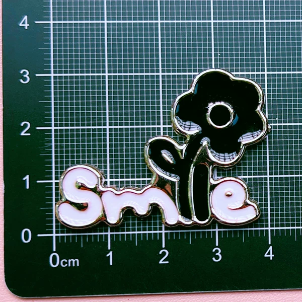 Black flower white letter plate