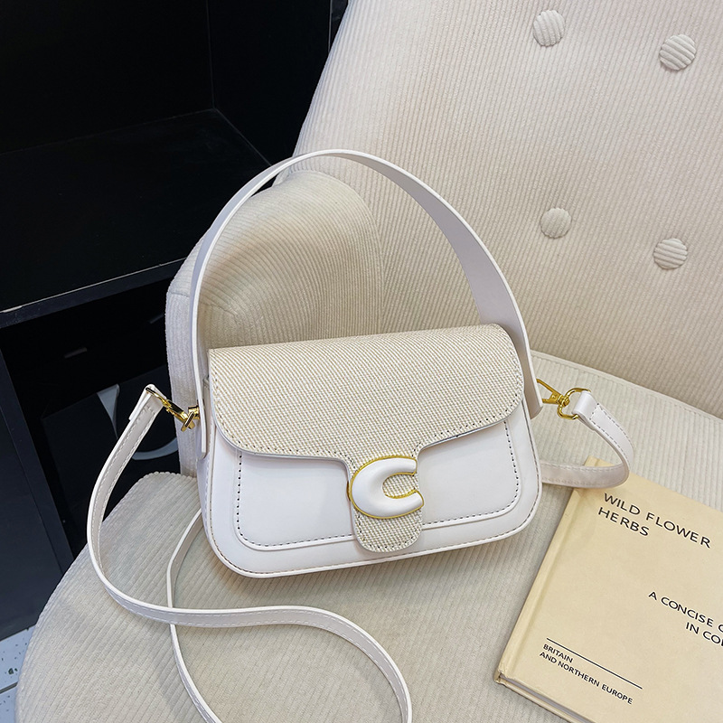 Bolsos de hombro empalmados en primavera, bolsos cuadrados de color de choque, bolsos de silla de montar de moda de nicho francés, bolsos de ocio