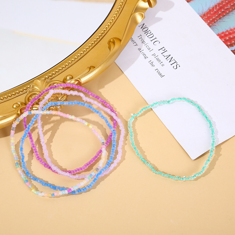 Joyas transfronterizas europeas y americanas, verano, perlas luminosas de colores de todo fósforo, tobillera de cuentas de arroz, pulsera creativa simple, marea de playa multiusos