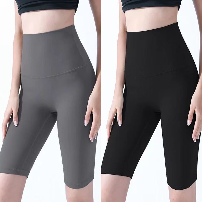 Pantalones cortos desnudos de mujer elásticos apretados para elevar las caderas de cinco puntos pantalones deportivos de secado rápido succión de sudor entrenamiento para correr fábrica de comercio de ping