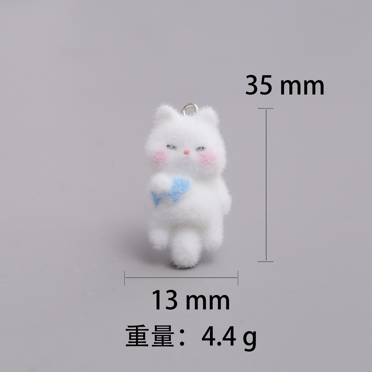 물고기를 안고 있는 고양이