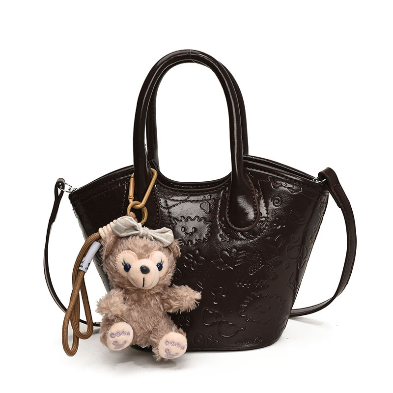 Nicho coreano bolsas de cesta de verduras de mano primavera de mujeres 2025 nueva moda encantadora bolsa en relieve bolsas de mochila