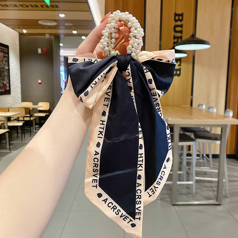 Banda de pelo de bufanda de seda corbata de pelo femenina Shixi Cinta de lazo de perla sale todo partido cuerda de cabeza Shixi 2021 cabello nuevo