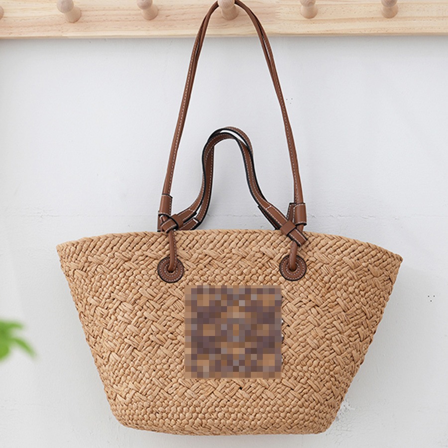 Paquete de paja de un solo hombro 2023 nuevo paquete de tejido de paja de luojia en verano paquete de tejido de playa de vacaciones al por mayor paquete de playa para mujeres