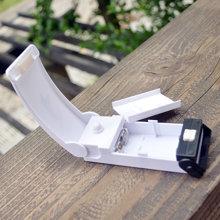 Máquina de sellado del hogar pequeña máquina de sellado del hogar bolsa de alimentos bolsa de plástico presión de la mano máquina de sellado ventas directas de la fábrica