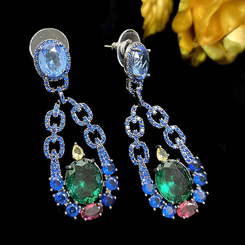 Wholesale Jewelry Exaggerated Shiny Oval Metal Zircon Inlay Drop Earrings display picture 1