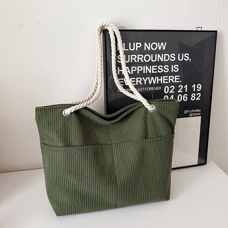 Otoño y invierno retro moda de gran capacidad de tela de cordillera 2024 nueva textura de bolso de hombro de mamá