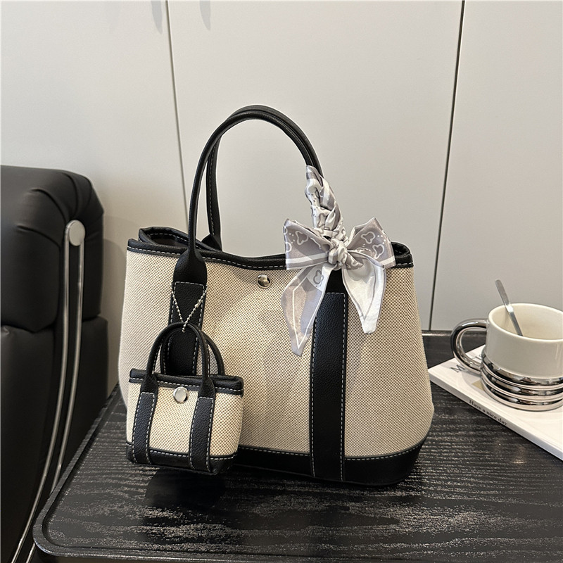 2025 nuevo bolso de lona para mujeres gran capacidad sen-meng simple otoño hombro portátil bolso especial para estudiantes universitarios
