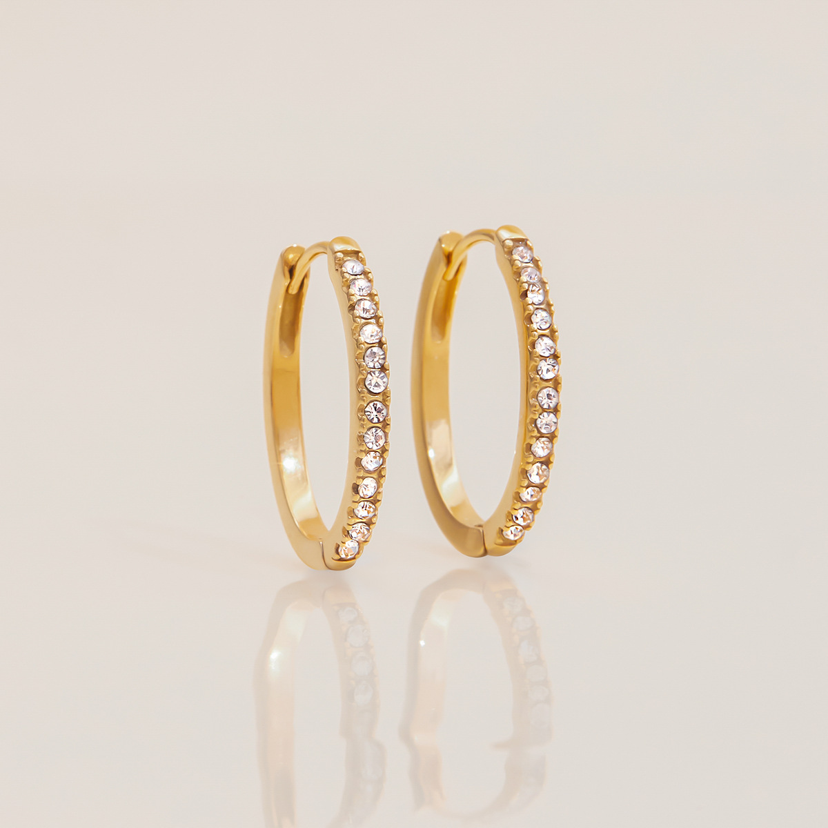 Jieding Pendientes de diamantes de círculo de acero inoxidable europeo y americano Pendientes de lujo ligero de alta calidad Pendientes de acero de titanio que no se desvanece Joyas transfronterizas
