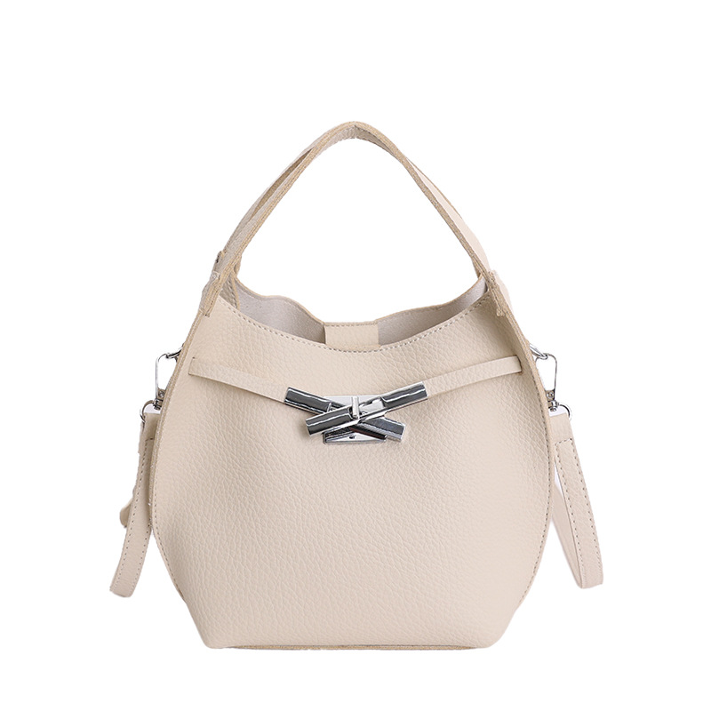 Bolso de mujer nuevo estilo coreano nicho de moda lichi bolso de cubo portátil de alta sensación de ocio mochila de viaje