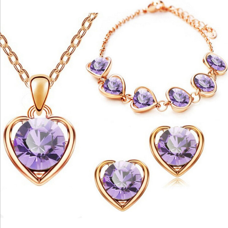 Directo de fábrica al por mayor en stock moda cristal Corazón en forma de corazón collar pendientes anillo pulsera conjunto de cuatro piezas