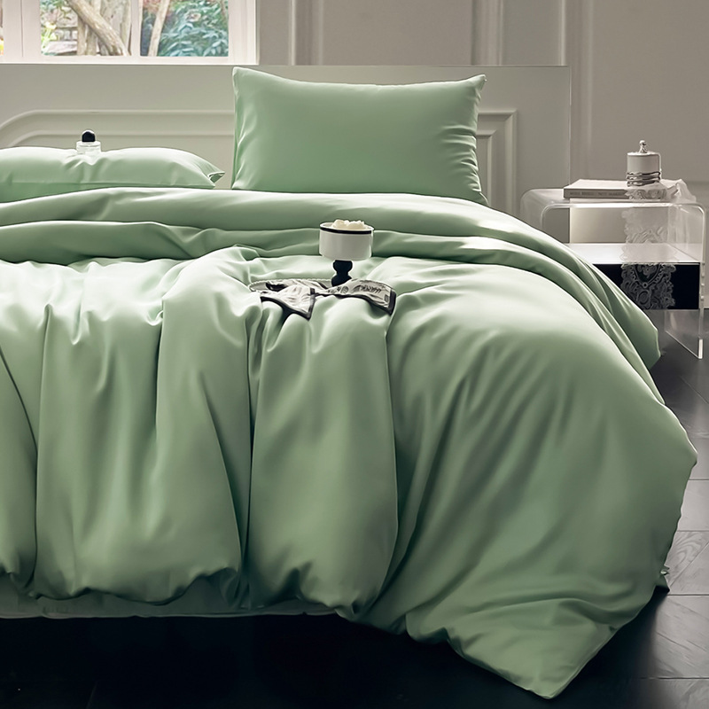 Juego de cama de verano de cuatro piezas de seda de hielo de lujo ligero 2025 nueva funda de edredón sábana sábana sábana ropa de cama desnuda sedosa