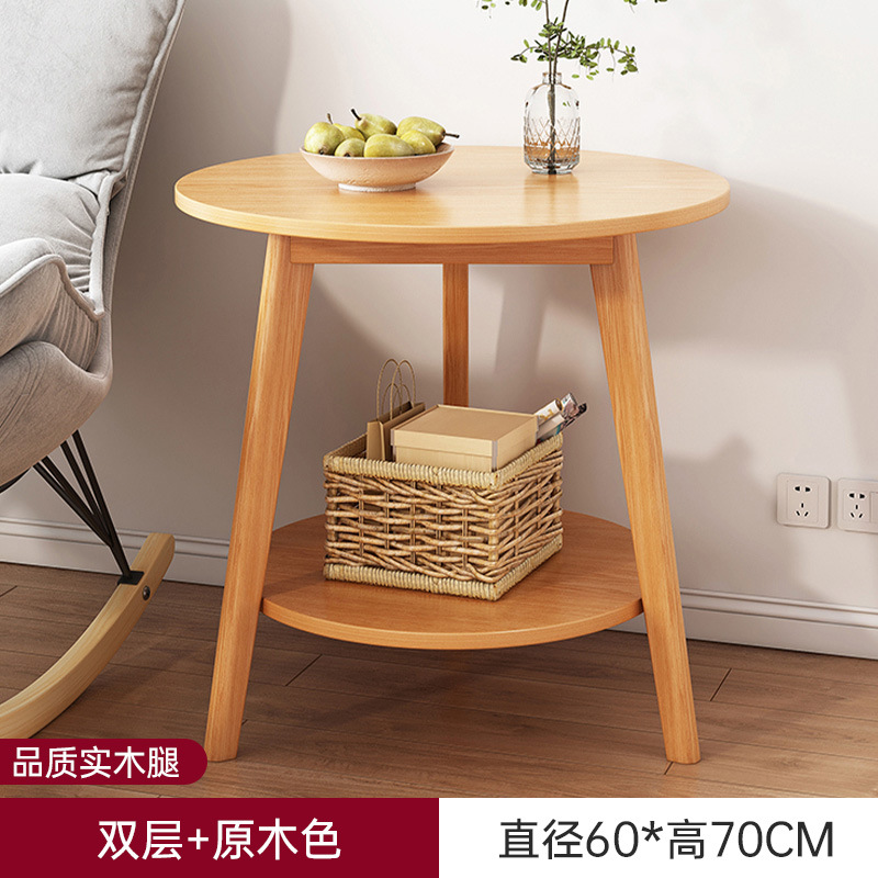 Sofá de la sala de estar pequeña mesa redonda doméstica, estante de cabecera de cama moderno y minimalista, mesa de té creativa con balcón