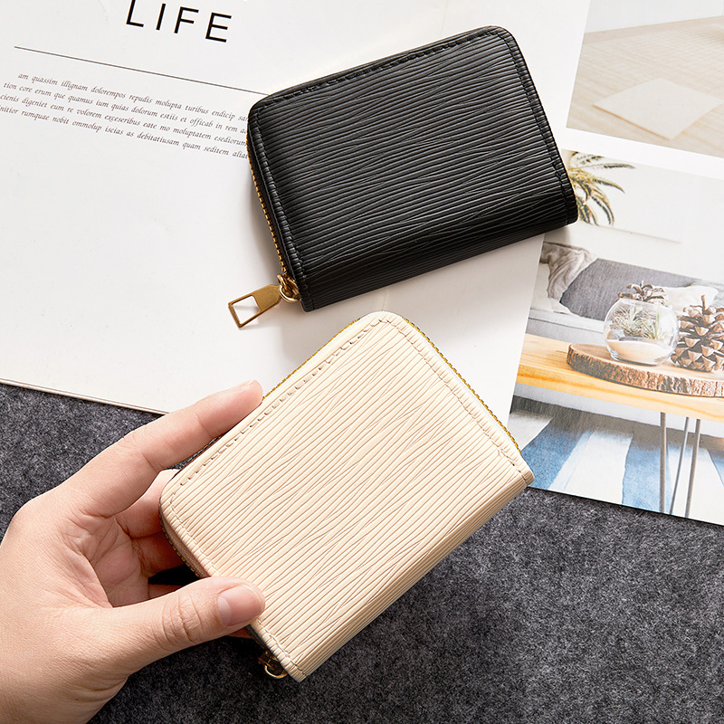 Monedero corrugado de agua corto para mujer transfronteriza japonesa 2024 billetera pequeña con cremallera bolso de mano corto bolso de moneda