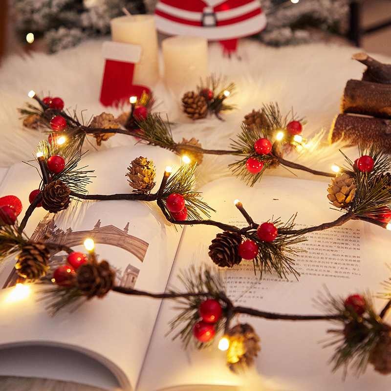 LED Navidad lámpara de cobre pin aguja de pino campana decoración de fruta roja lámpara cadena caja de baterías caña decoración interior