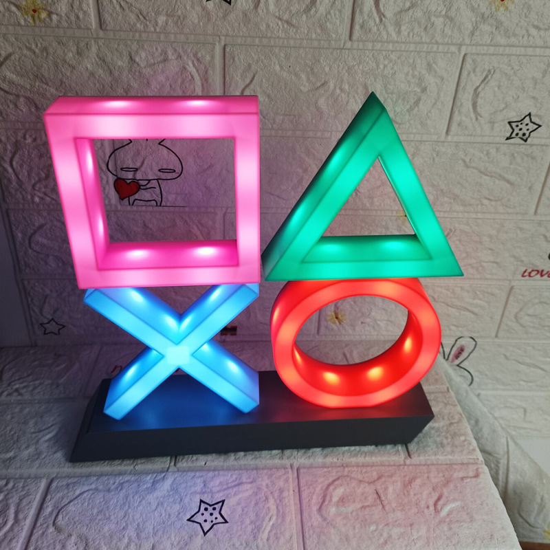 Luz con forma de signo de interrogación que mueve la lengua, luz con sonido de expresión de fantasma, luz de ambiente de juego, luz nocturna activada por voz de Toy Story.