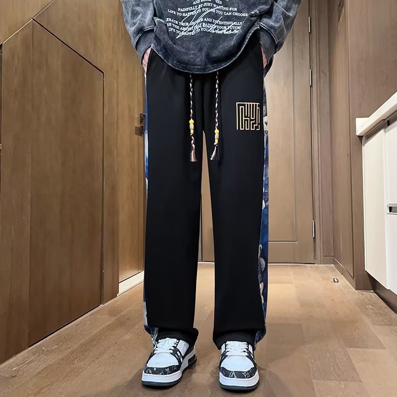 Pantalones de oso de marea nacional de primavera y otoño de los hombres marca de moda recta suelta pierna ancha 2025 nueva tendencia pantalones casuales de todo fósforo