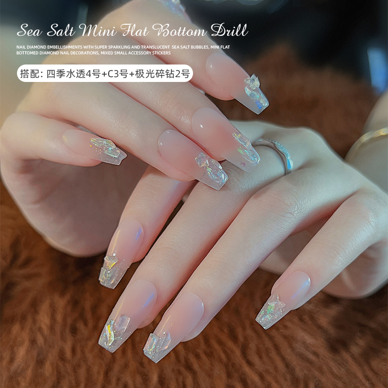 Popular en línea popular sal de mar burbuja arte de uñas diamante en forma especial tamaño pequeño color de fondo transparente Aurora mezclado joyería de uñas al por mayor