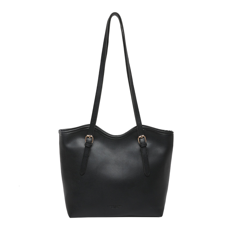 2025 primavera nueva versión coreana de la personalidad brazo bolso de mano de estilo casual simple de viaje bolso de hombro