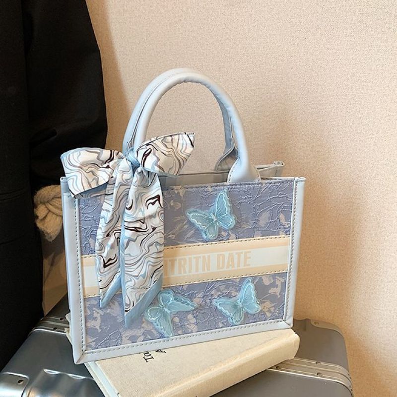 新しいカジュアル通勤大容量バッグガールズファッションジャカード刺繍漫画ジッパー蝶脇の下バッグ|undefined