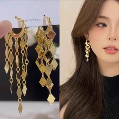 キラキラ独特のひし形のフリンジイヤリング女性の豪華な高級感の金色のイヤリングは大気独特のイヤリングを誇張しています。