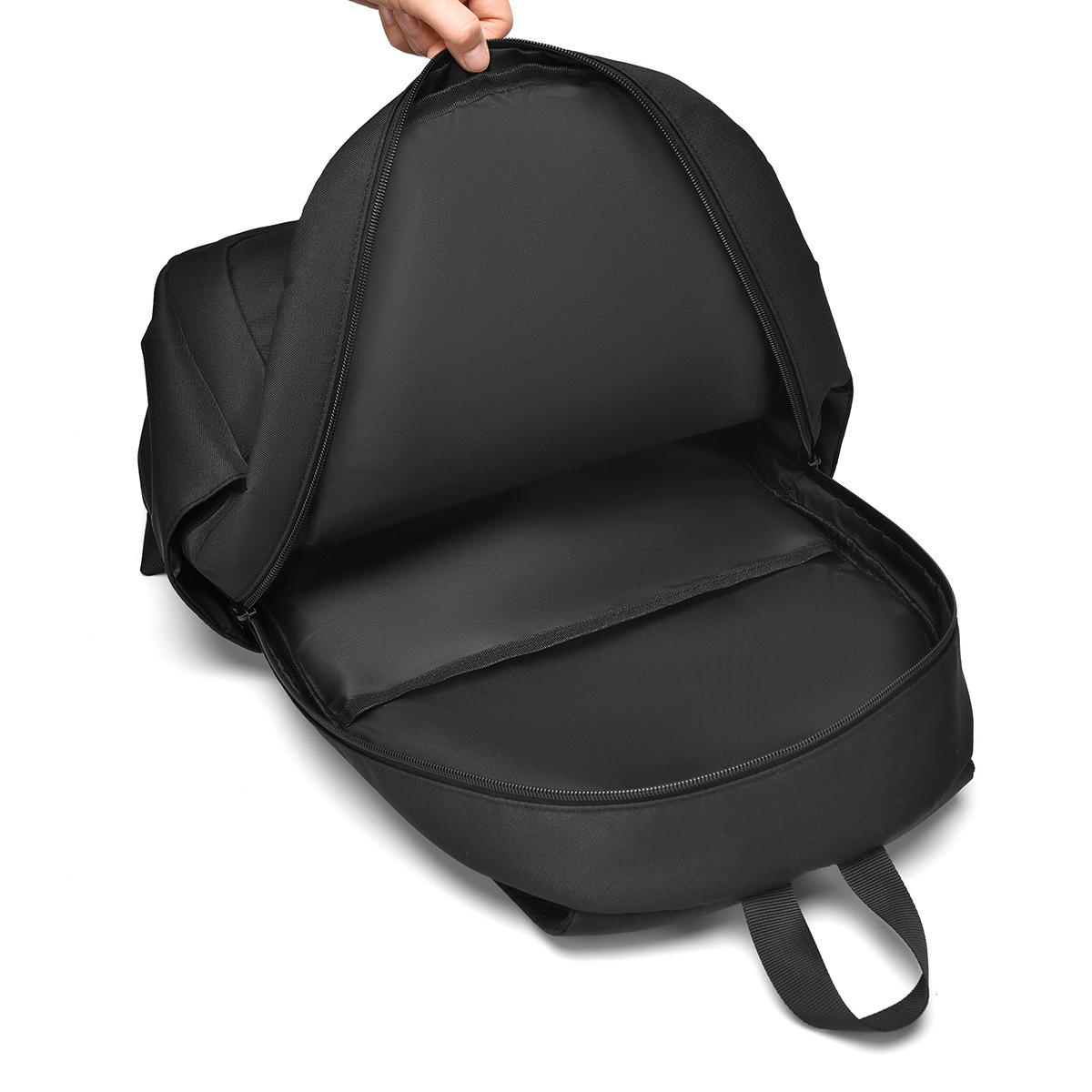 Mayorista nueva mochila de negocios de comercio exterior para hombres y mujeres nueva mochila de computadora de viaje simple bolsa de gran capacidad