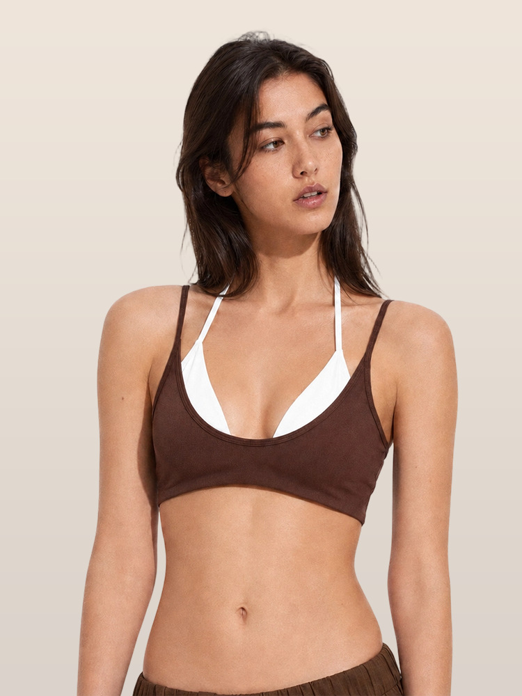 Europa y Estados Unidos de color transfronterizo falso empalme dos piezas chaleco deportivo cabina ropa de yoga hombro colgante cuello mujer con cojín de pecho