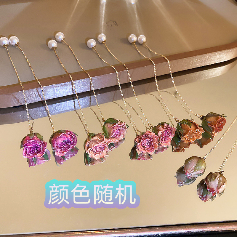 Mori Super Fairy Silver Needle Yongshenghua Pendientes de moda de temperamento de todo fósforo Pendientes de nicho de lujo ligero Pendientes de alta gama al por mayor