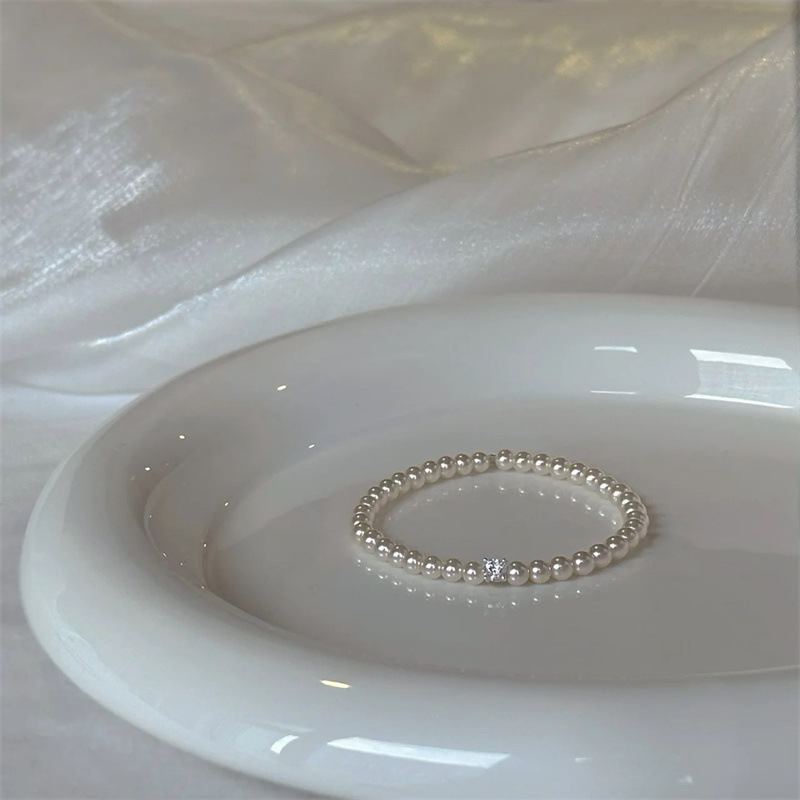 Pulsera de perlas de circón Pulsera de temperamento simple y elegante francesa Moda de lujo ligero Retro de alta gama Joyas al por mayor para mujer