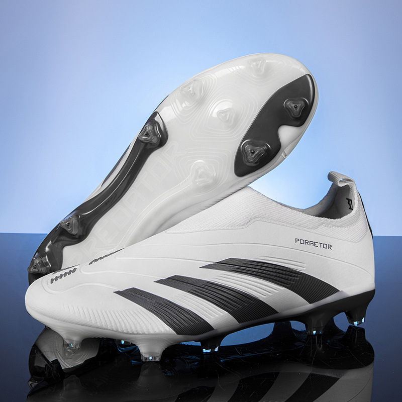 Zapatos de fútbol transfronterizos sin costuras cortados tf clavos de clavos adultos AG clavos niños y niñas zapatos de entrenamiento de estudiantes al por mayor